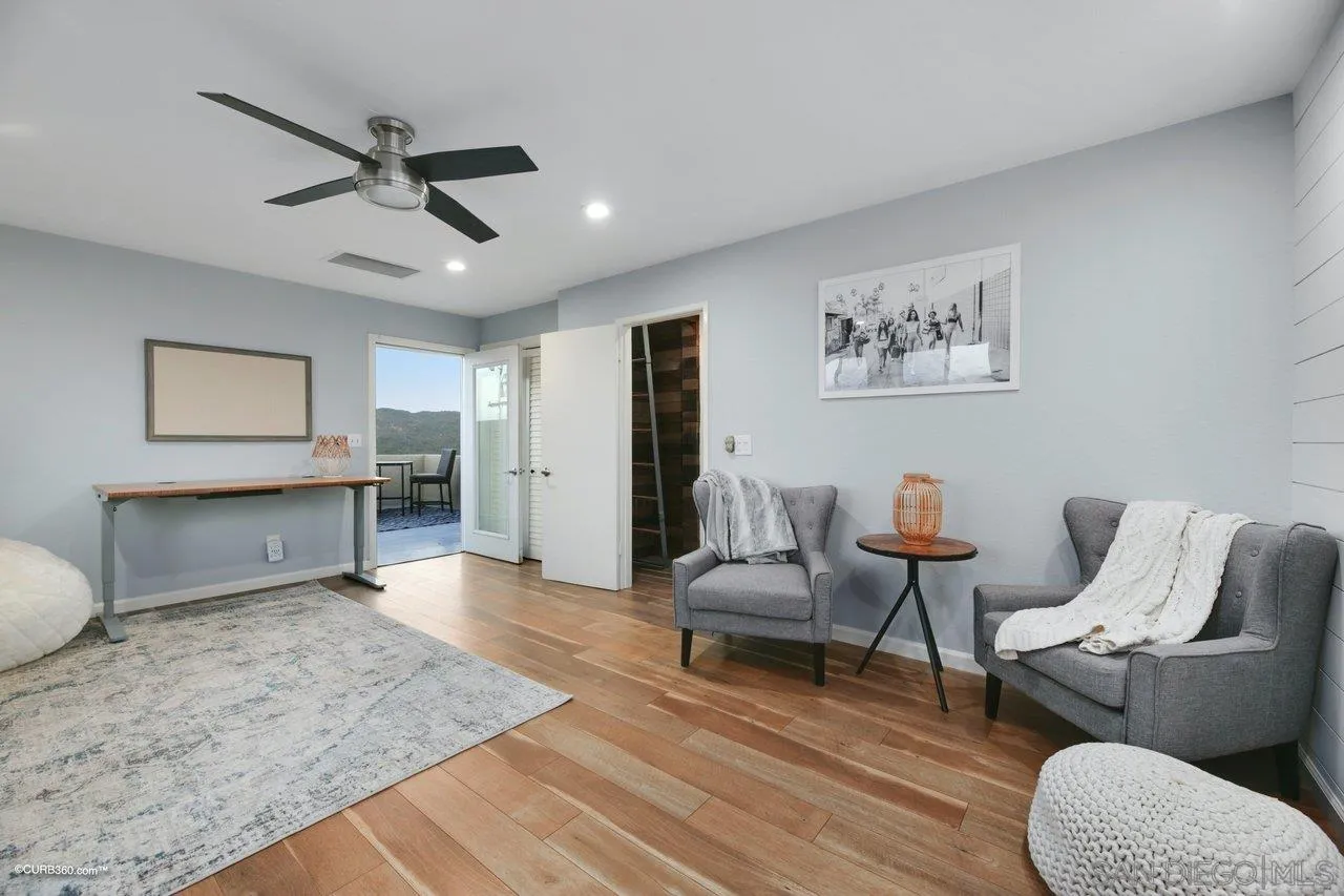 2925 Cordrey Drive Escondido, CA 92029 - Photo 35 of 75 a living room with furniture and a wooden floor
