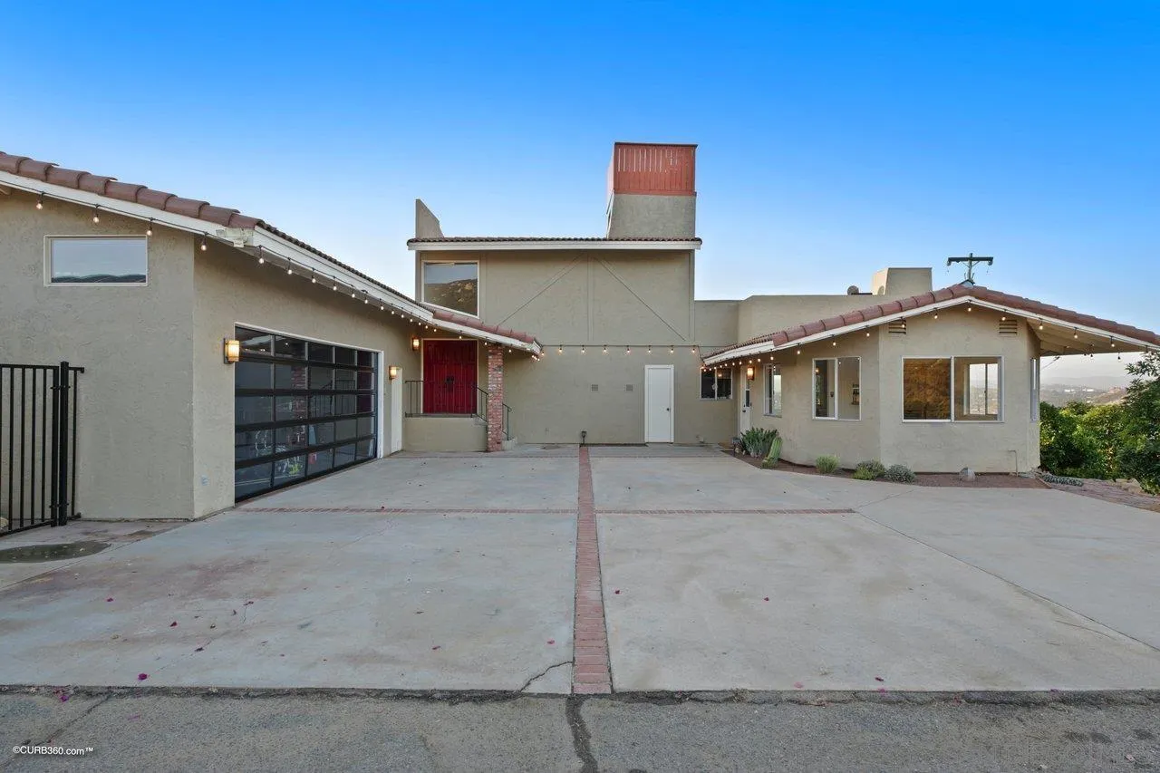 2925 Cordrey Drive Escondido, CA 92029 - Photo 50 of 75 a view of a house with a backyard
