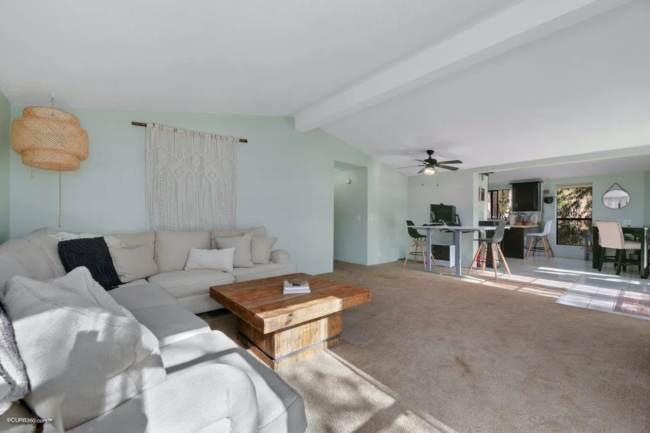2925 Cordrey Drive Escondido, CA 92029 - Photo 56 of 75 a living room with furniture a table and chairs