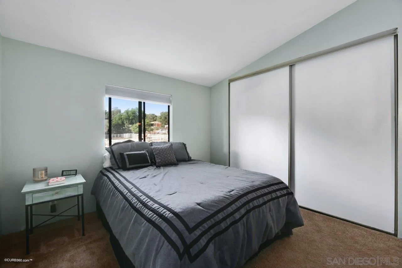 2925 Cordrey Drive Escondido, CA 92029 - Photo 69 of 75 a bedroom with a bed and a window
