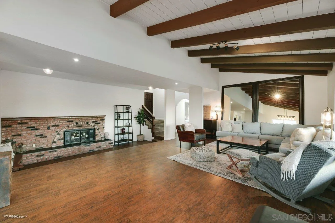 2925 Cordrey Drive Escondido, CA 92029 - Photo 10 of 75 a living room with furniture and a fireplace