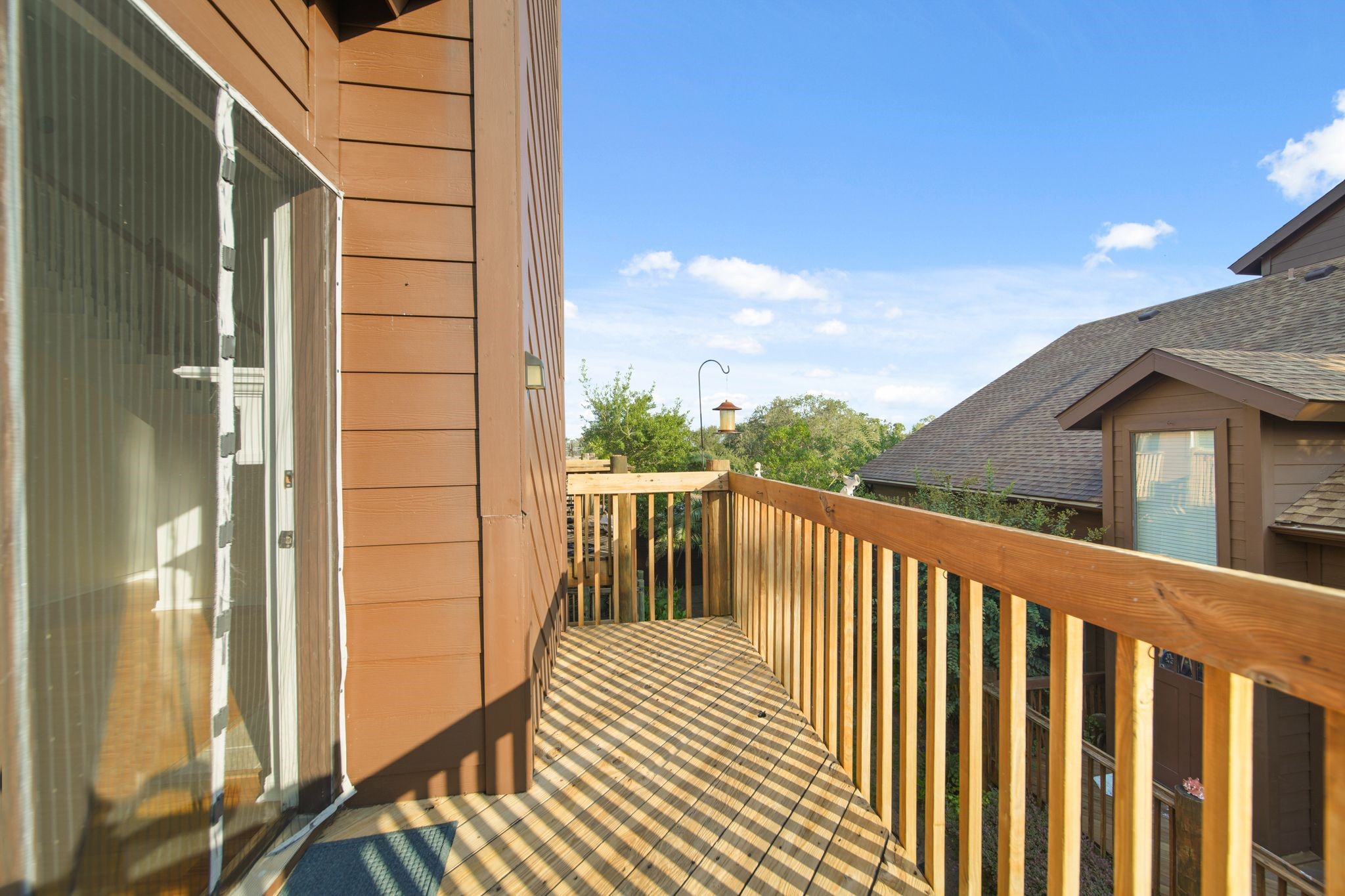 813 Davis Road League City, TX 77573 - Photo 21 of 22 a view of a balcony with wooden floor