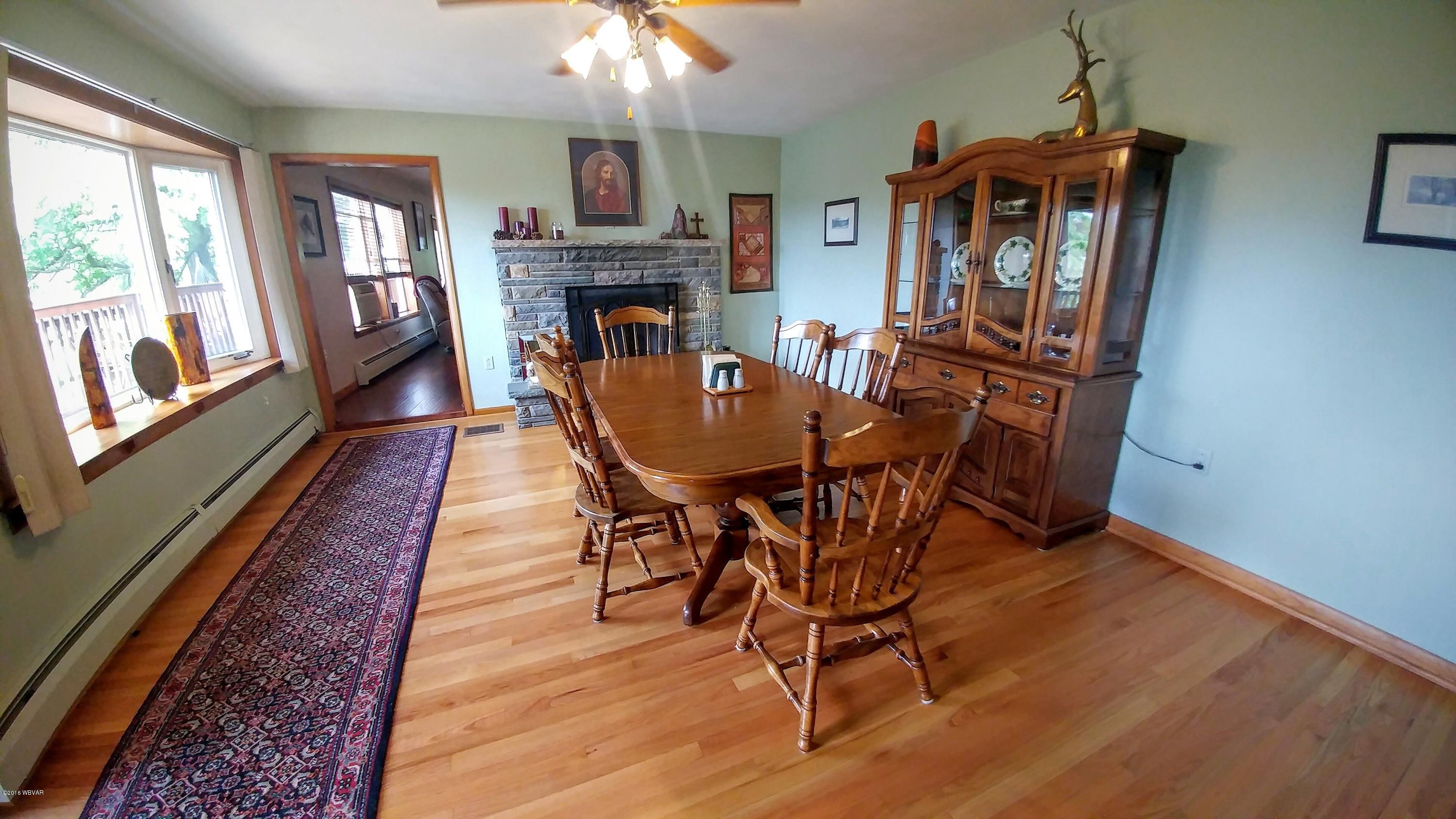152 Heim Road Cogan Station, PA 17728 - Photo 14 of 35 Dining Room with Fireplace