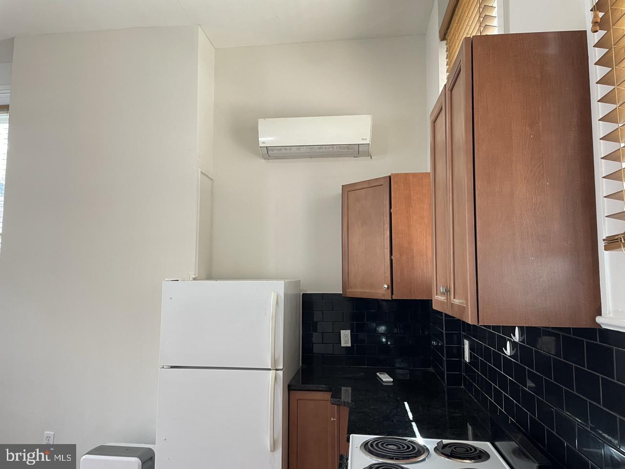 1601 Shakespeare Street, Unit 1R Baltimore, MD 21231 - Photo 6 of 10 a bathroom with a mirror