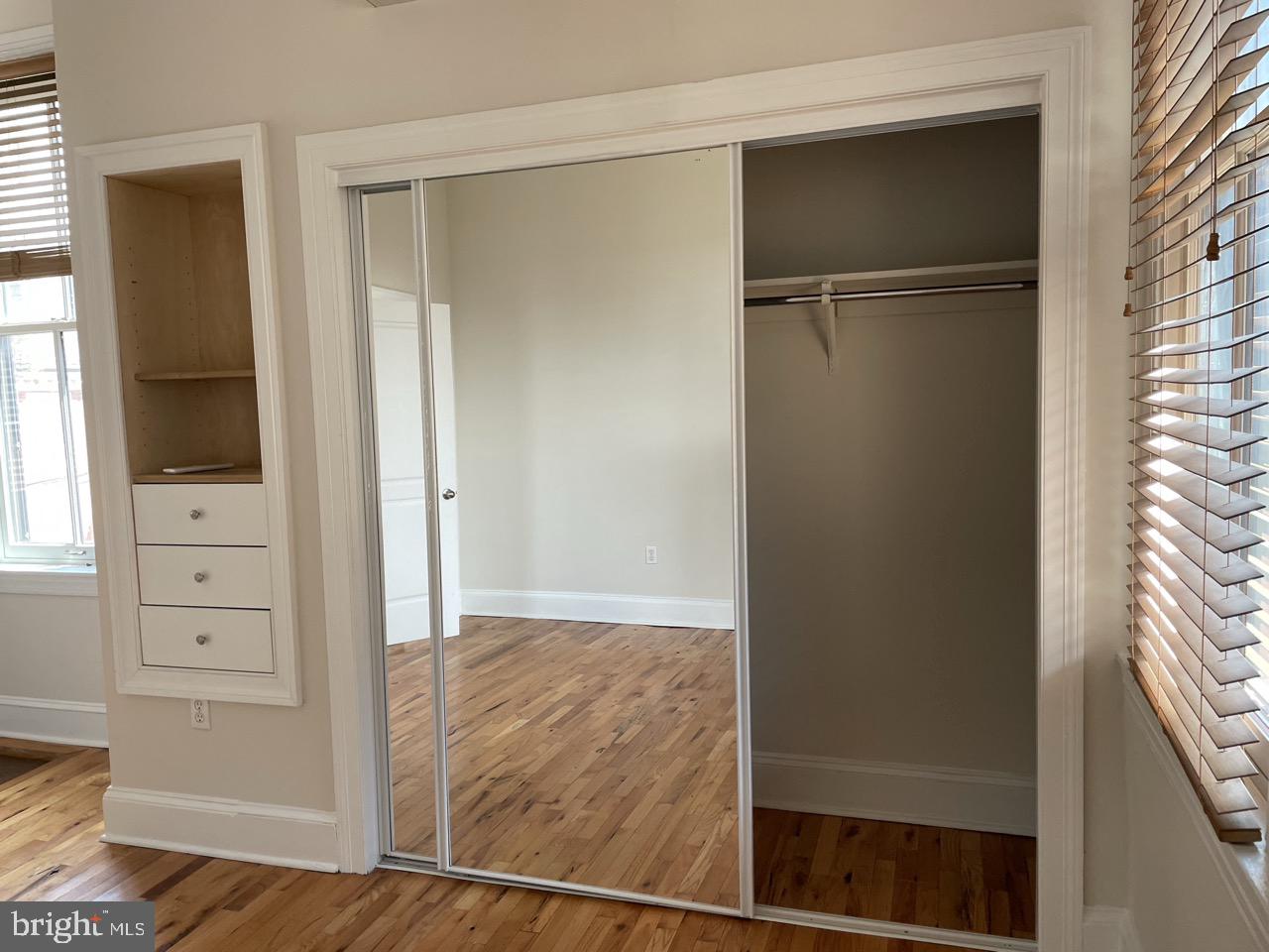 1601 Shakespeare Street, Unit 1R Baltimore, MD 21231 - Photo 8 of 10 wooden floor in an empty room