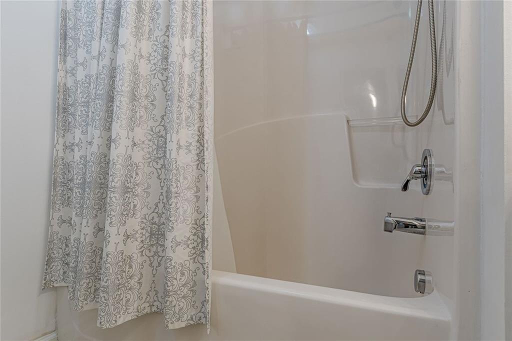 7640 Rutgers Circle Fairburn, GA 30213 - Photo 39 of 46 a bathroom with a shower