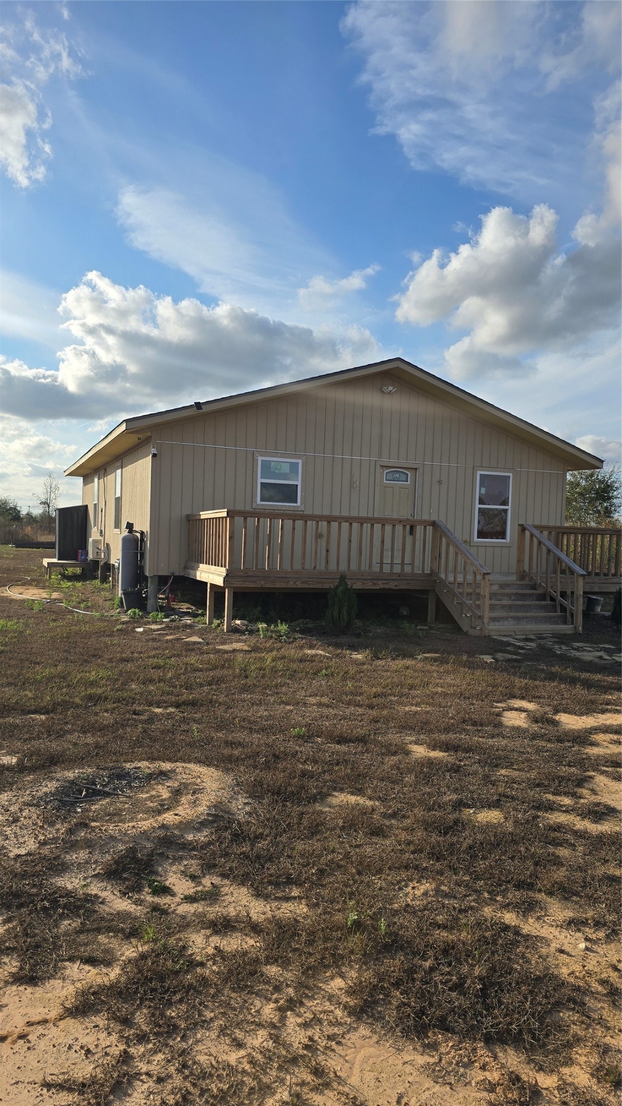 6076 Road 3550 Cleveland, TX 77327 - Photo 3 of 20 a view of a house with backyard