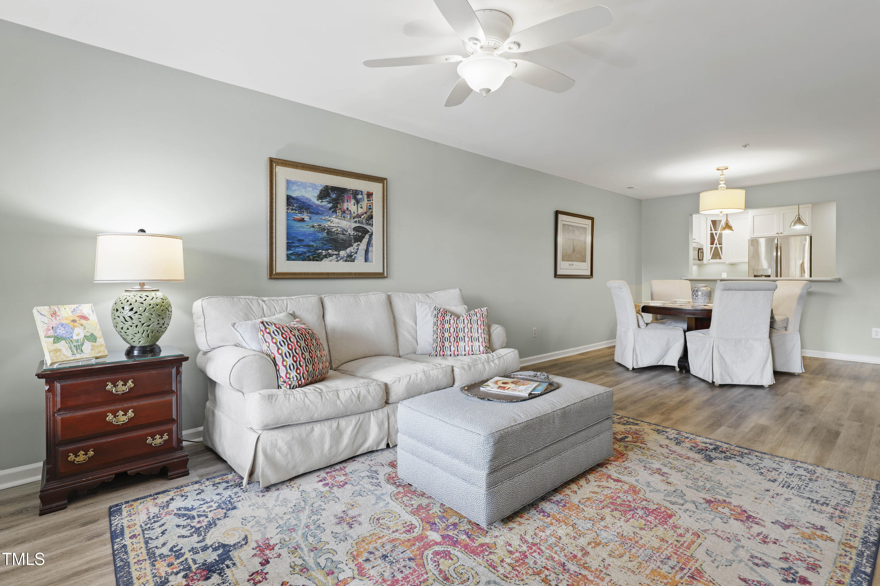 720 Springfork Drive Cary, NC 27513 - Photo 12 of 34 a living room with furniture and wooden floor