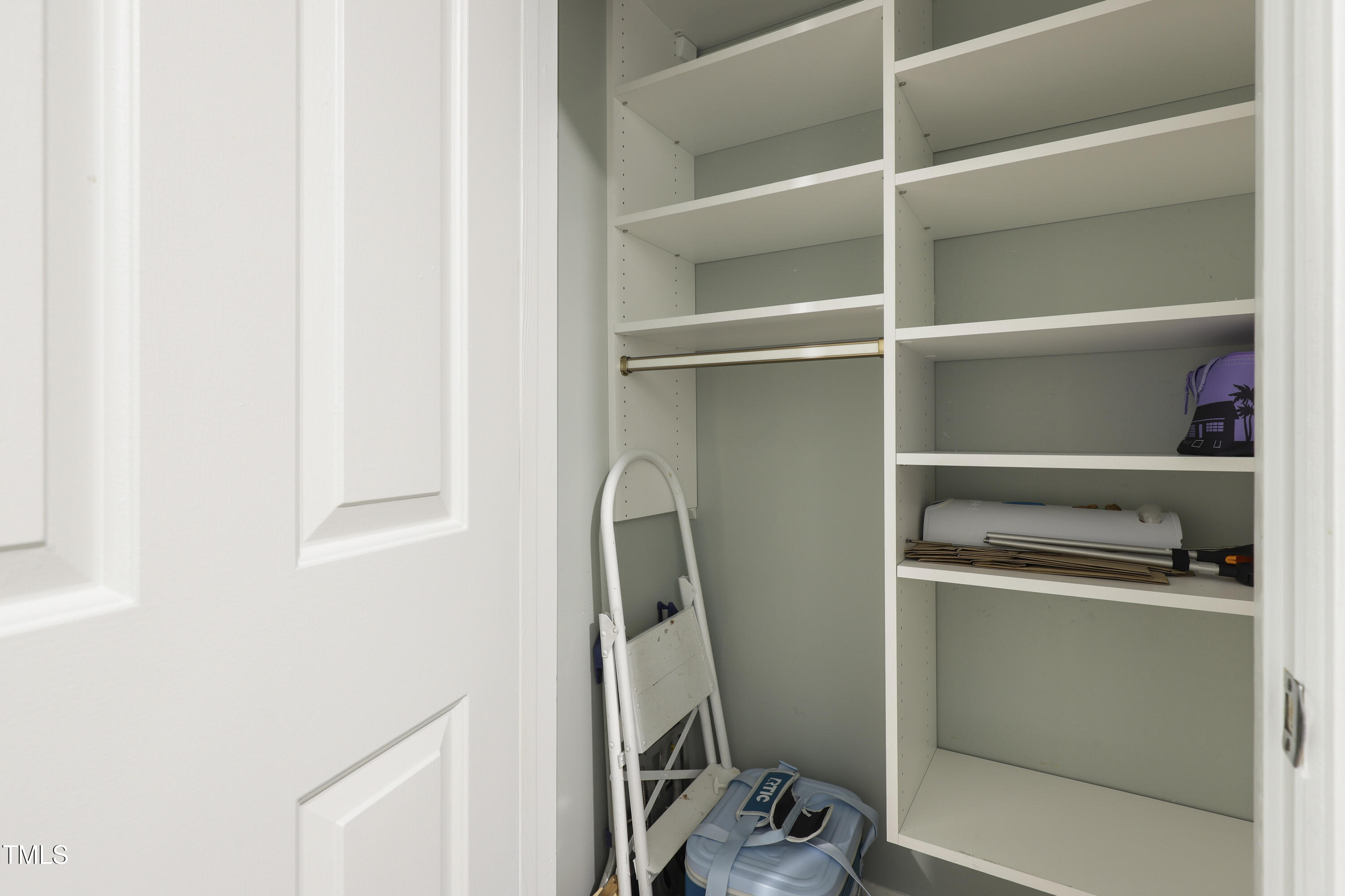 720 Springfork Drive Cary, NC 27513 - Photo 26 of 34 a room with a closet and wooden floor