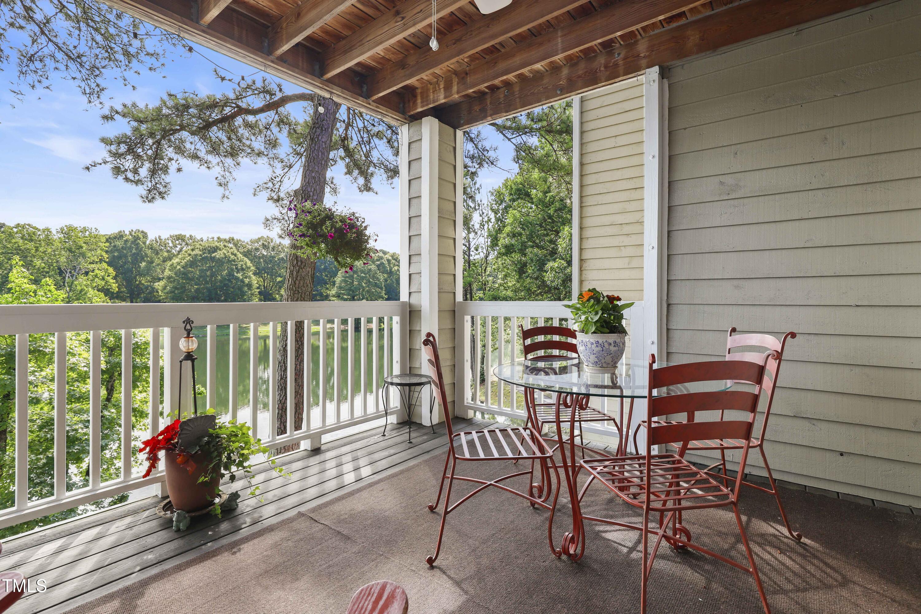 720 Springfork Drive Cary, NC 27513 - Photo 27 of 34 a view of a chairs and table in the patio