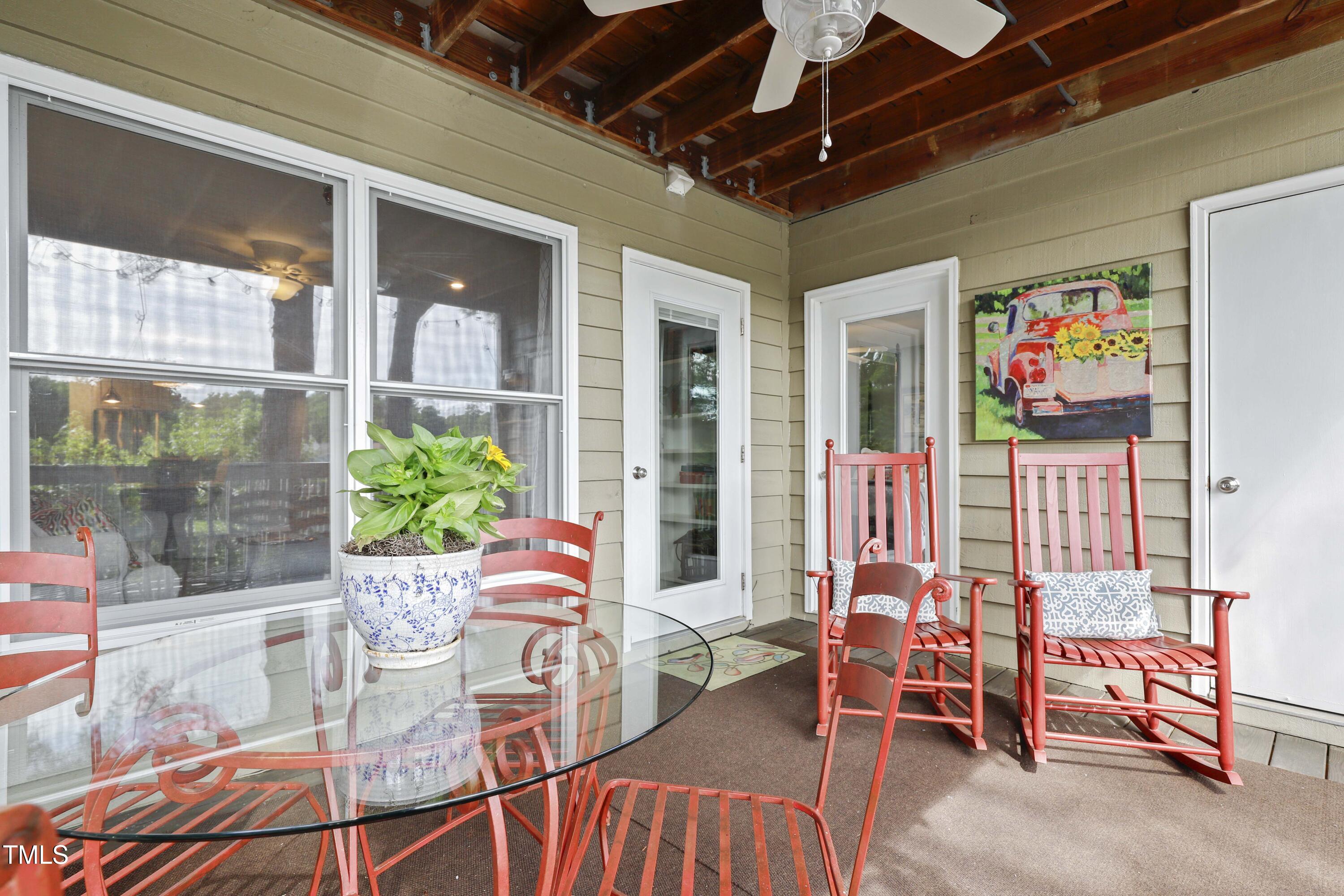 720 Springfork Drive Cary, NC 27513 - Photo 28 of 34 a outdoor living space with furniture and a potted plant