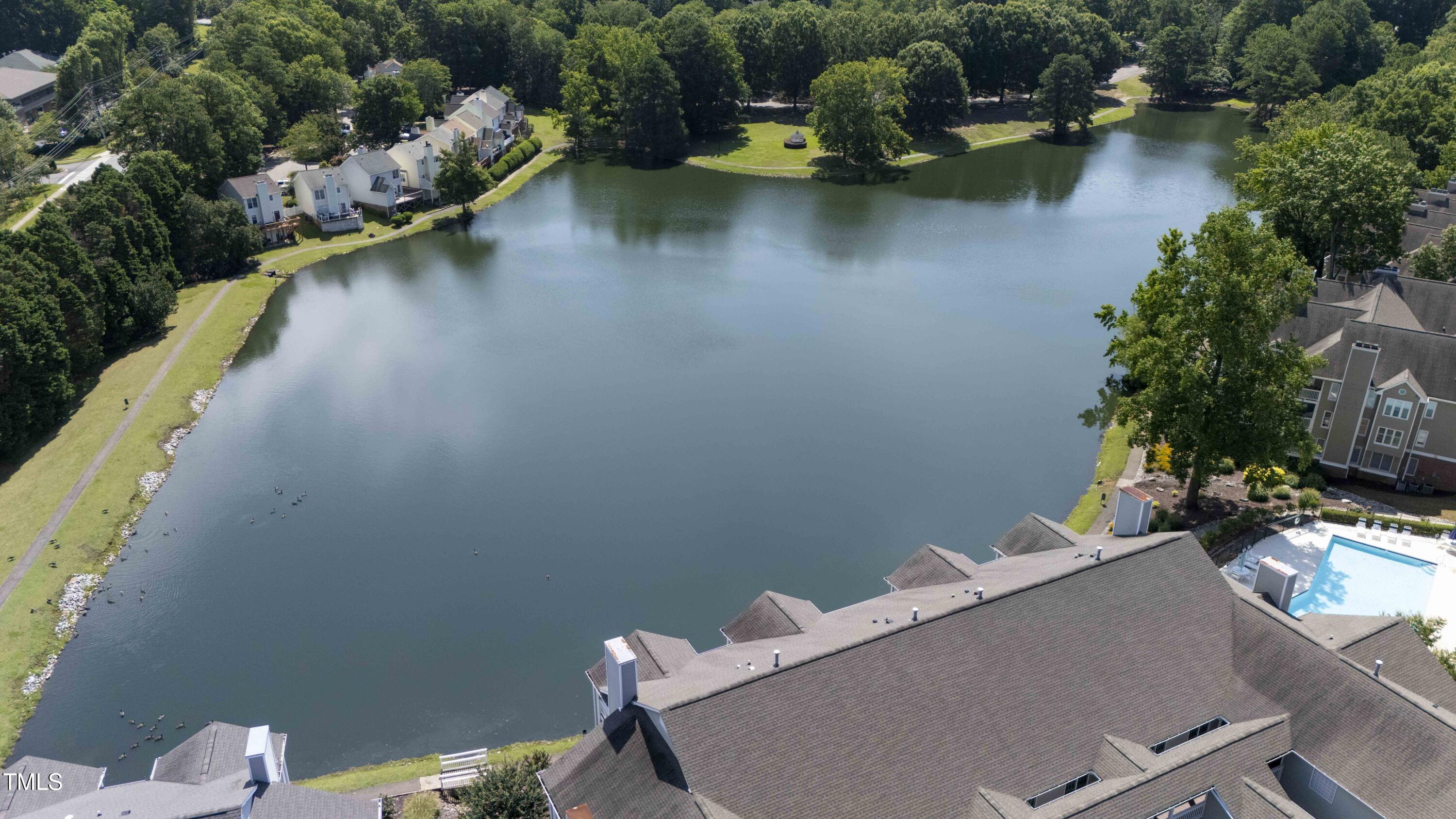 720 Springfork Drive Cary, NC 27513 - Photo 30 of 34 an aerial view of a house with swimming pool and outdoor space