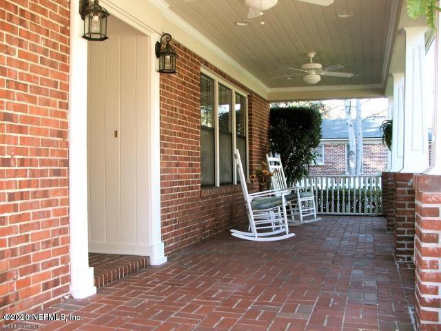 1318 Nicholson Road Jacksonville, FL 32207 - Photo 3 of 19 a view of a porch with a table and chairs