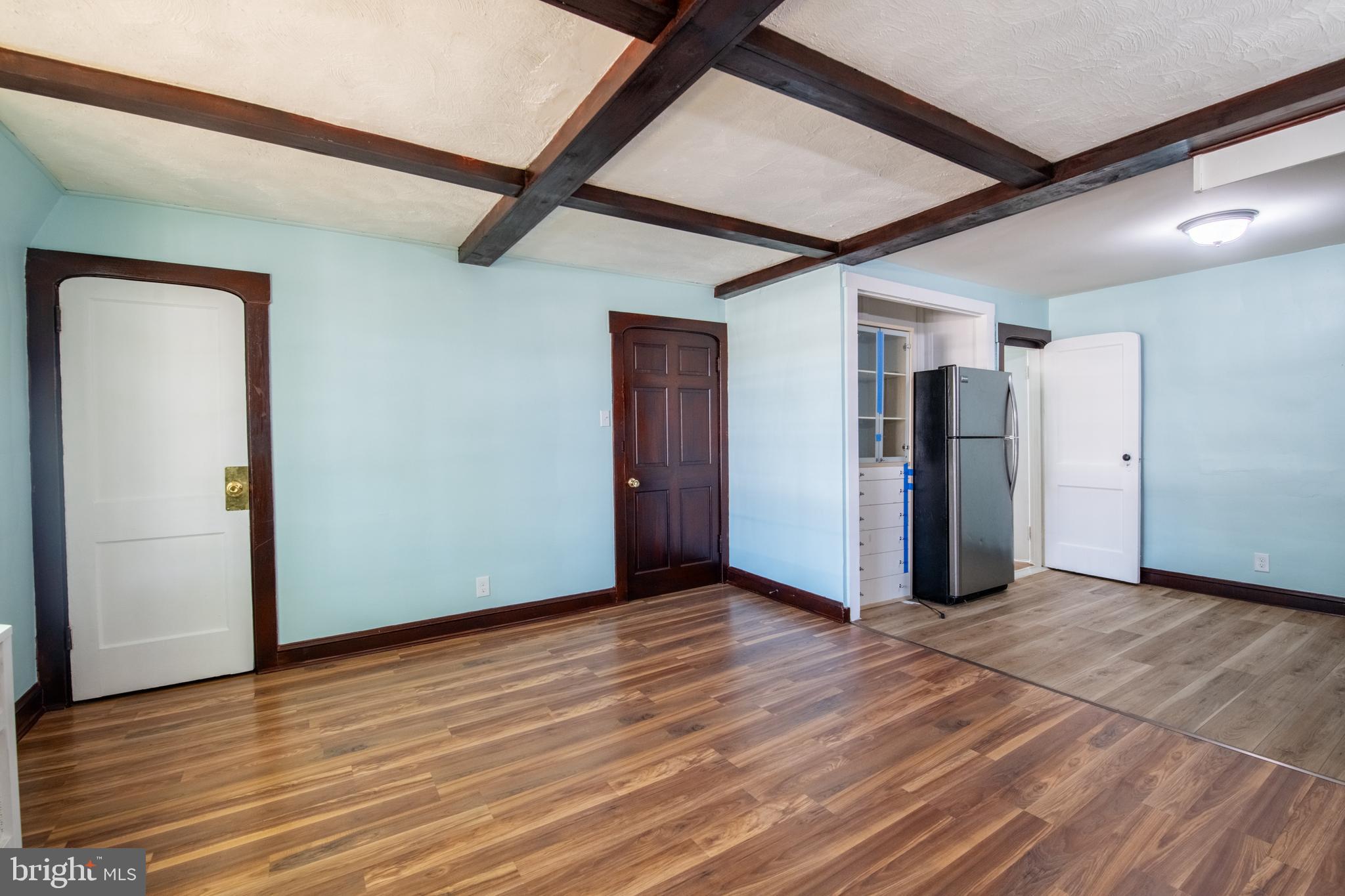 309 Hampden Road Upper Darby, PA 19082 - Photo 12 of 19 a view of an empty room with wooden floor