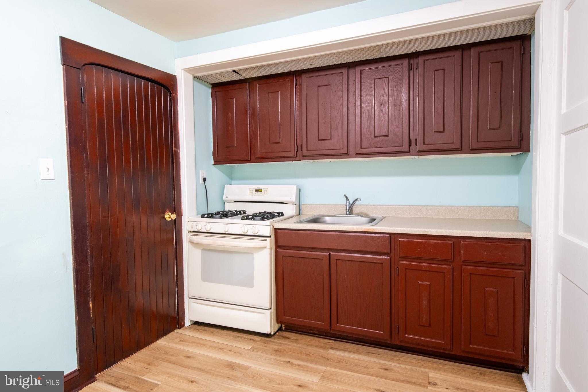309 Hampden Road Upper Darby, PA 19082 - Photo 15 of 19 a kitchen with a sink and cabinets