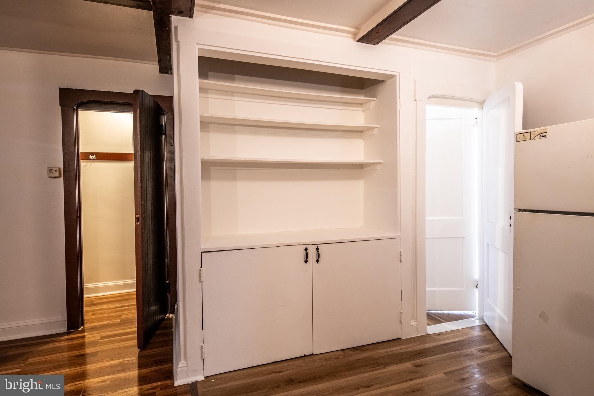 309 Hampden Road Upper Darby, PA 19082 - Photo 5 of 19 a view of walk in closet with empty racks