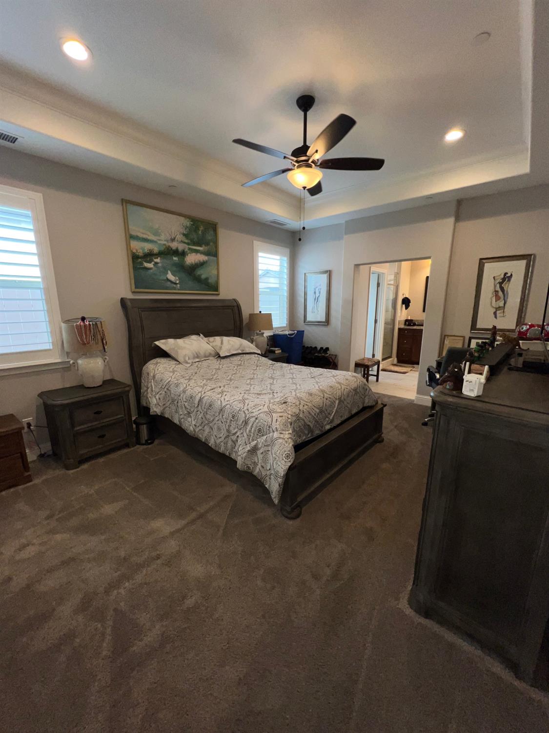 889 Coloma Place Madera, CA 93637 - Photo 34 of 61 a bedroom with a bed ceiling fan and a window