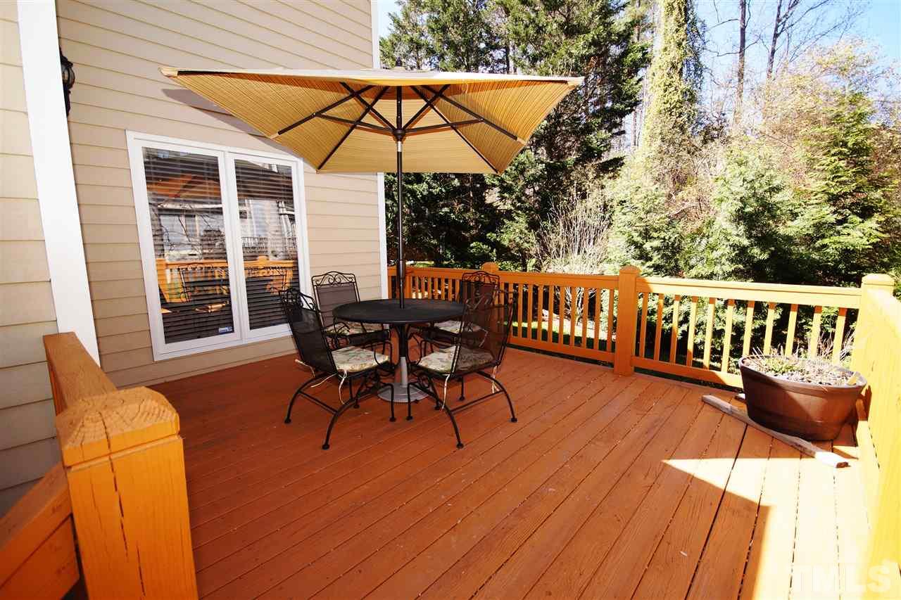4100 Landfall Court Raleigh, NC 27613 - Photo 18 of 20 a view of a chair and table on the deck
