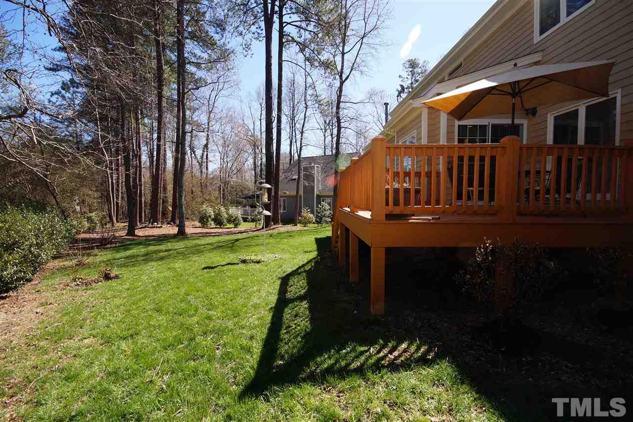 4100 Landfall Court Raleigh, NC 27613 - Photo 19 of 20 a view of a house with backyard and sitting area