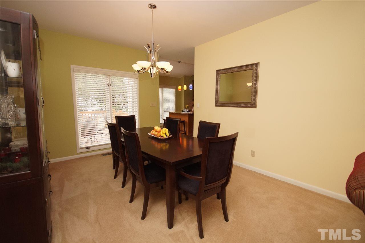 4100 Landfall Court Raleigh, NC 27613 - Photo 4 of 20 a view of a dining room with furniture window and outside view
