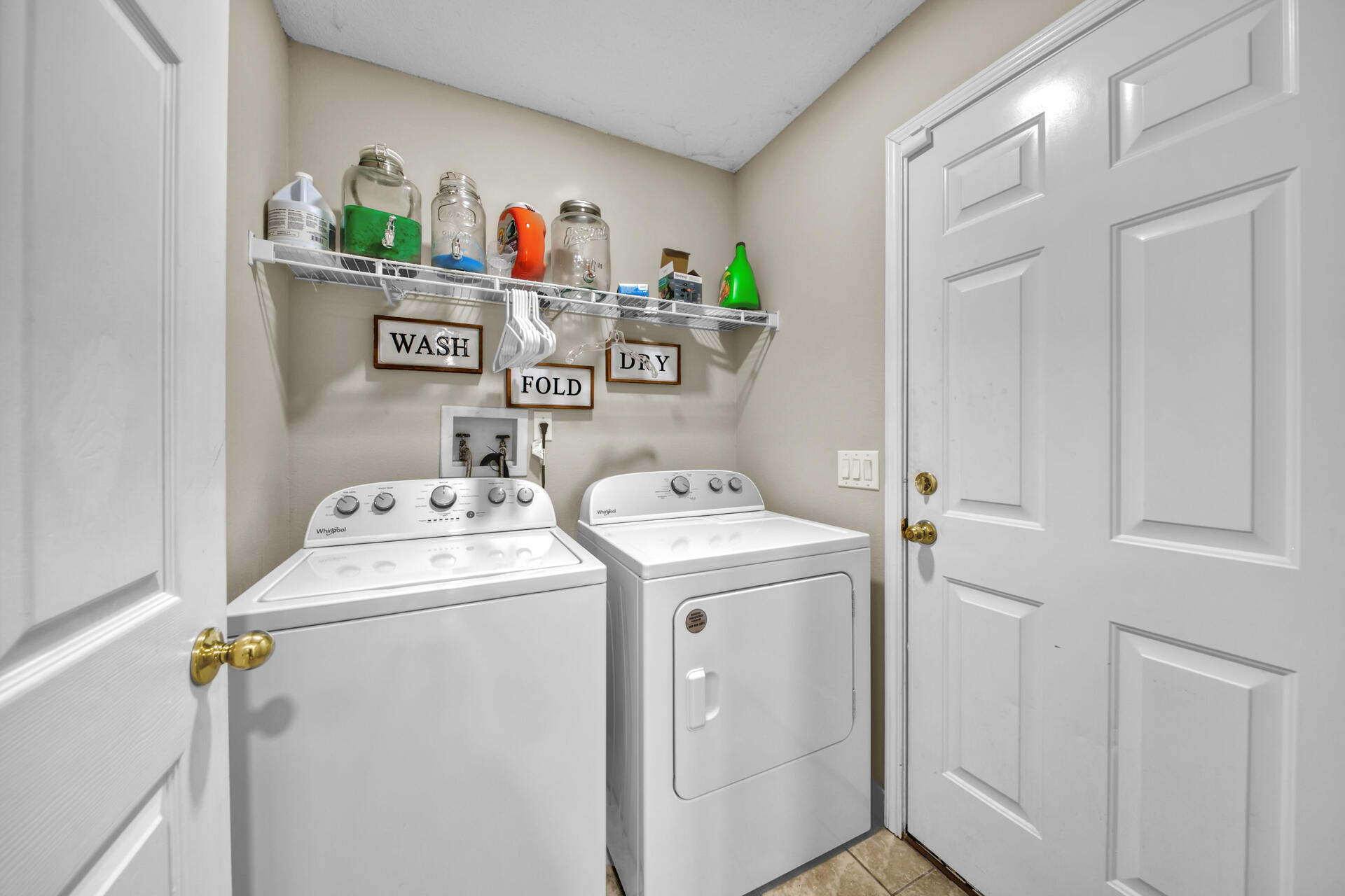 2837 Atoka Trail Crestview, FL 32539 - Photo 20 of 28 a utility room with dryer and washer