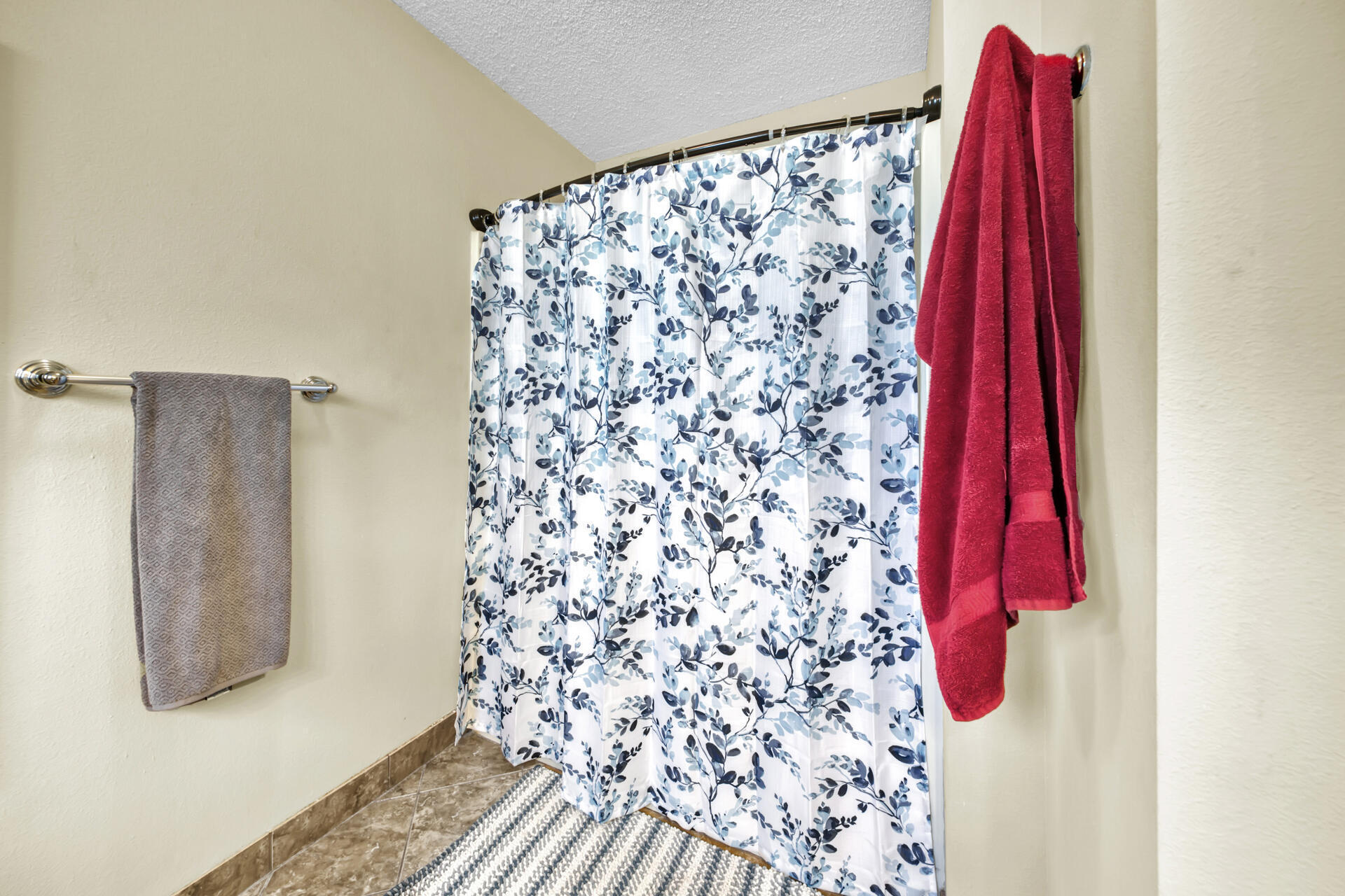 2837 Atoka Trail Crestview, FL 32539 - Photo 24 of 28 a bathroom with a shower curtain and a curtain
