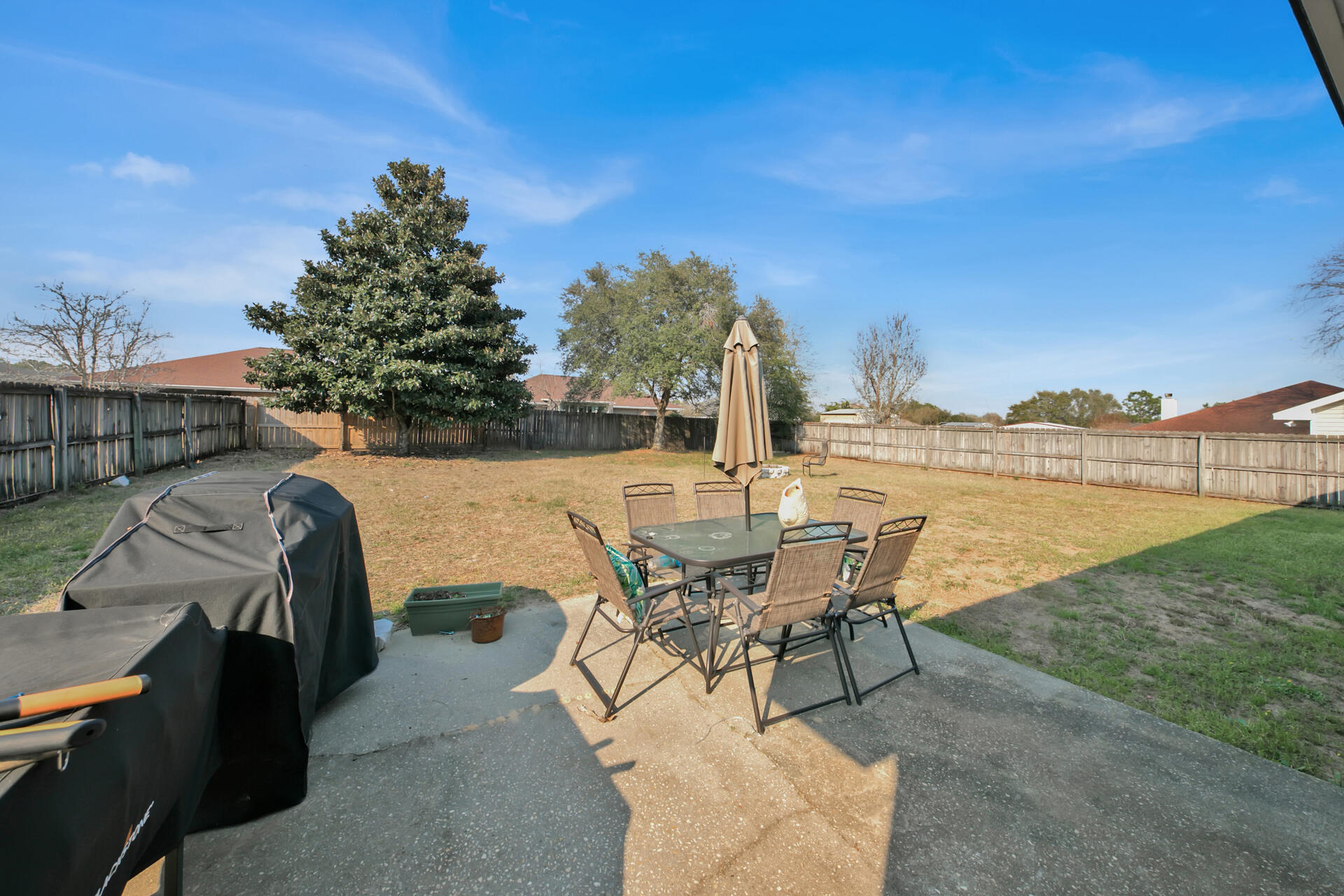 2837 Atoka Trail Crestview, FL 32539 - Photo 25 of 28 a view of a chairs and table on the terrace