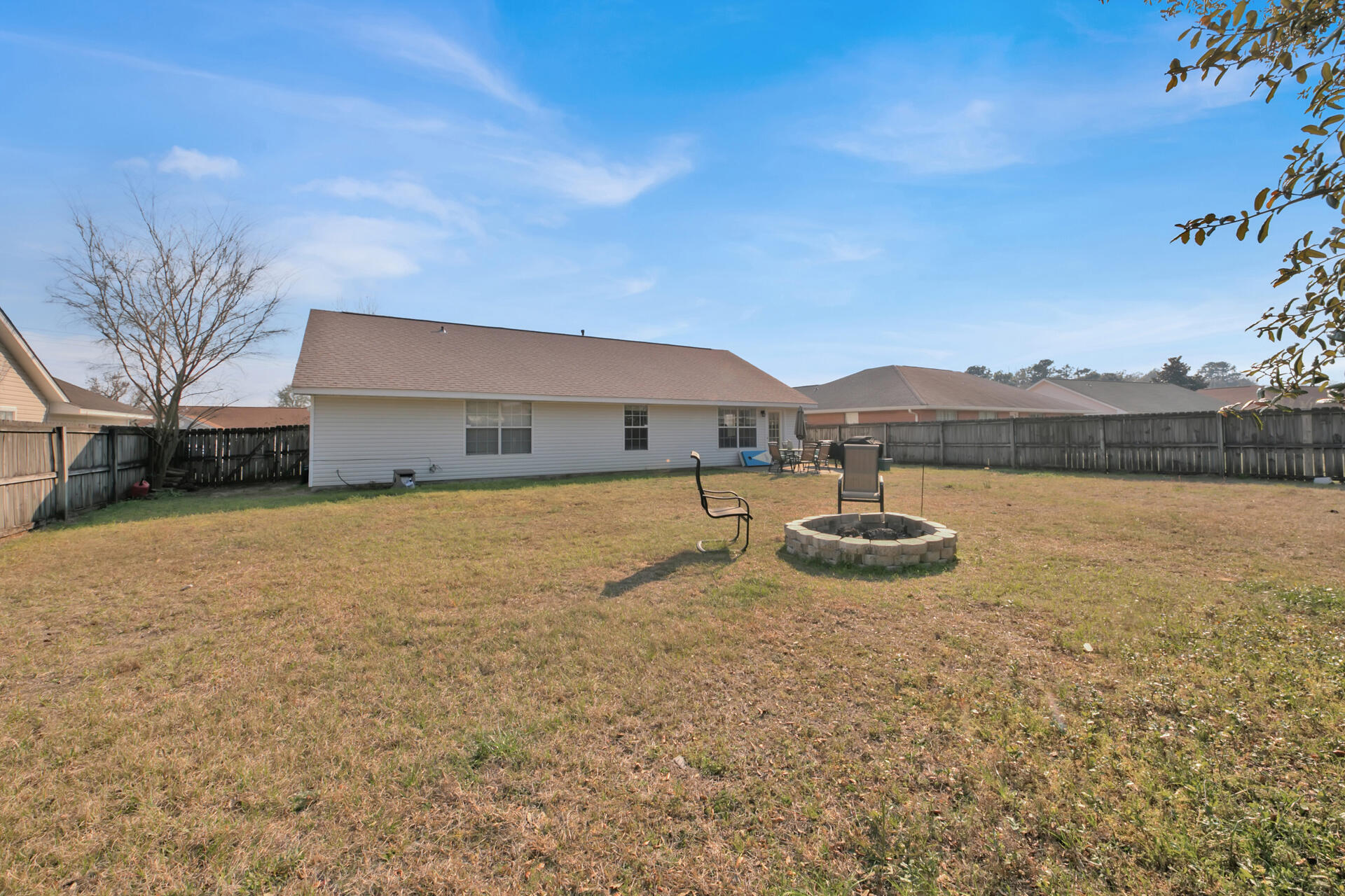 2837 Atoka Trail Crestview, FL 32539 - Photo 27 of 28 a front view of a house with garden