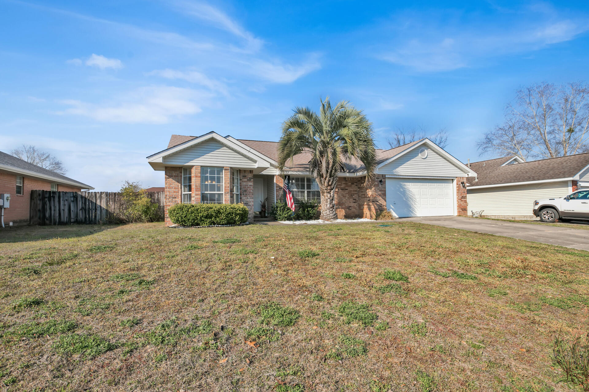 2837 Atoka Trail Crestview, FL 32539 - Photo 3 of 28 a front view of a house with a yard