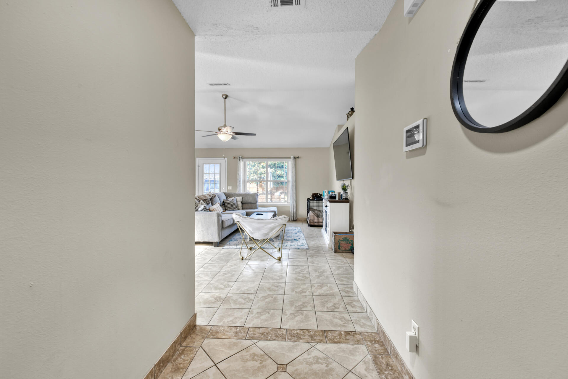 2837 Atoka Trail Crestview, FL 32539 - Photo 5 of 28 a view of living room with furniture and white walls