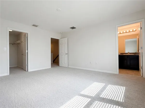 a view of an empty room and a gallery