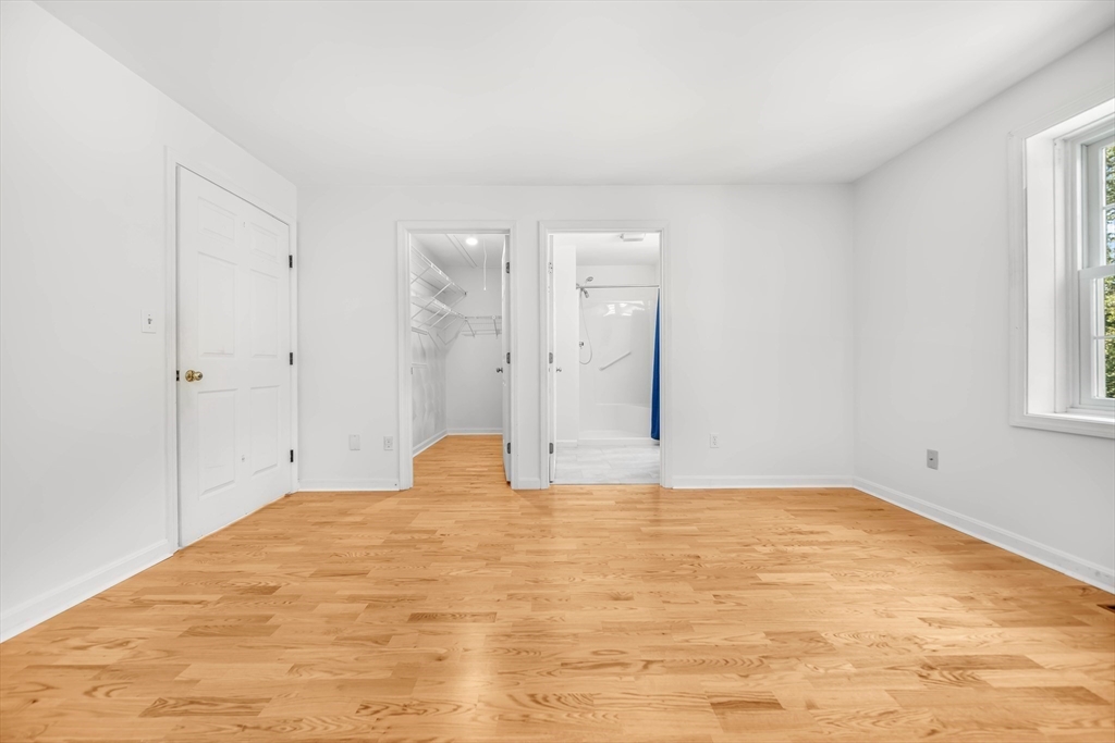 128 Audubon Drive, Unit 128 Acton, MA 01720 - Photo 13 of 42 a view of empty room with window