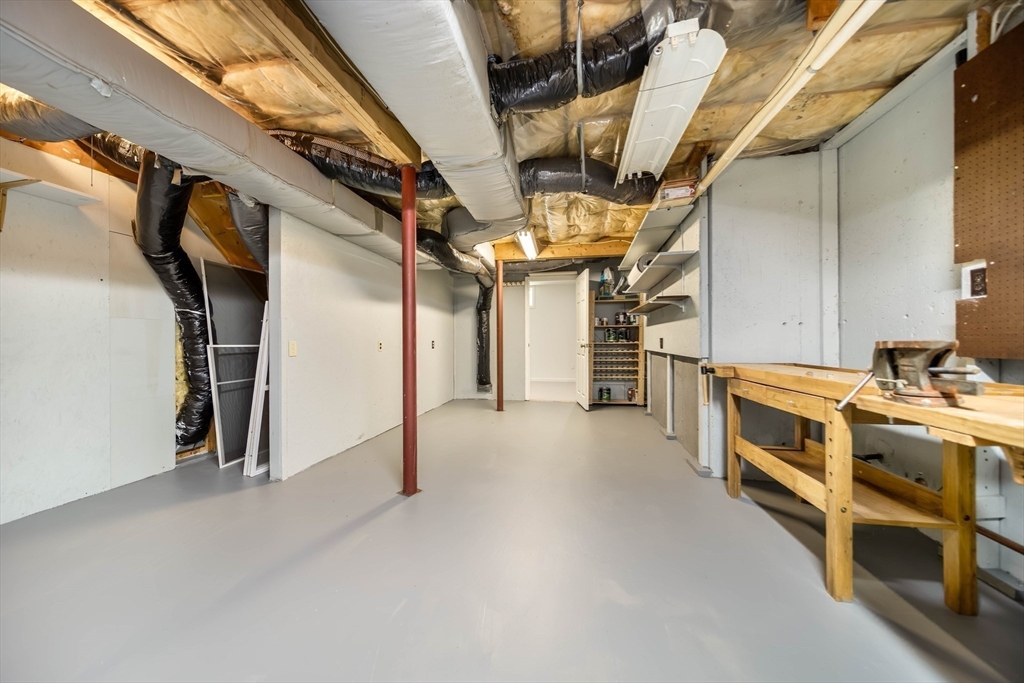 128 Audubon Drive, Unit 128 Acton, MA 01720 - Photo 28 of 42 a view of a storage & utility room