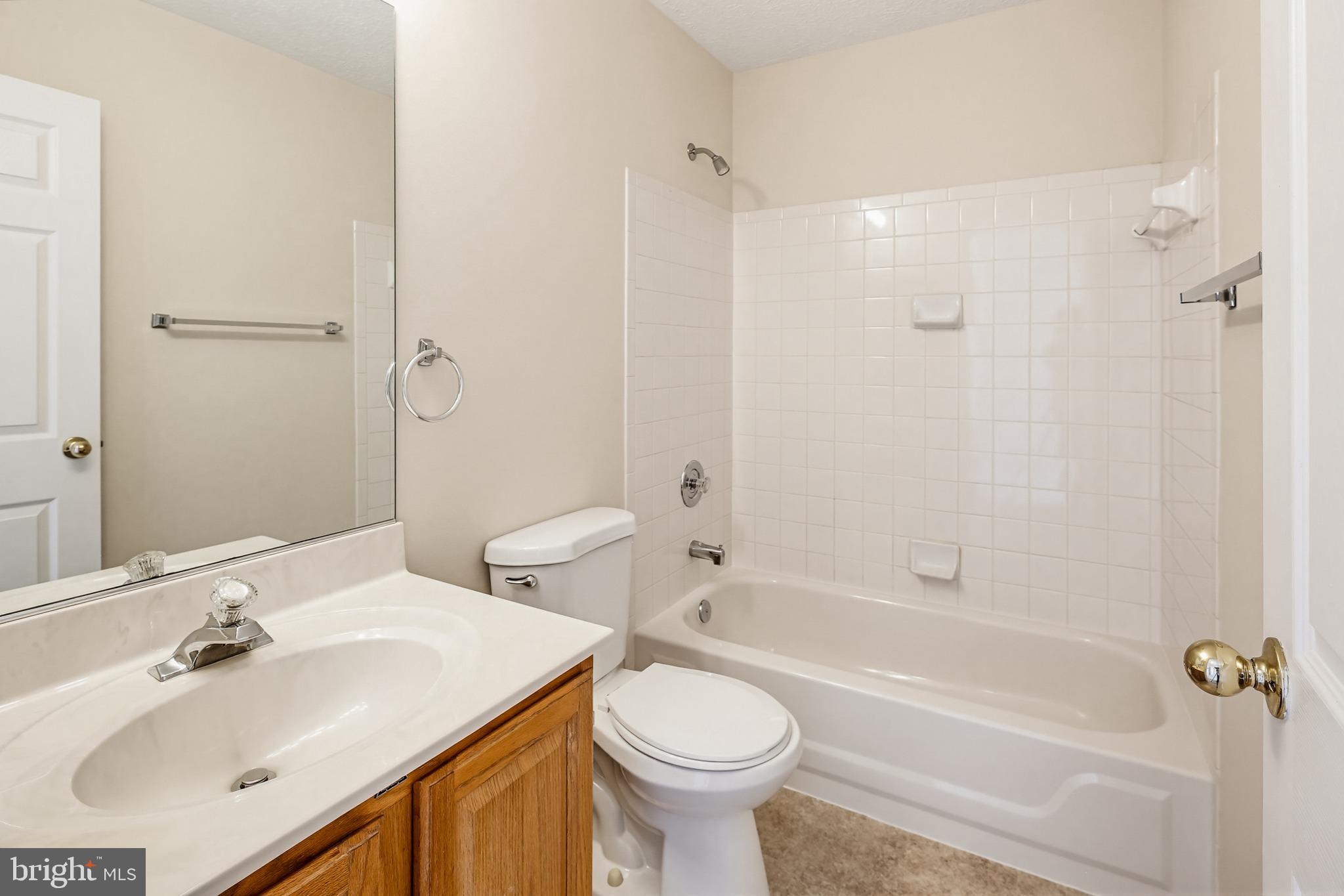 8266 Spring Branch Court Laurel, MD 20723 - Photo 44 of 73 Full bathroom in upper level hallway