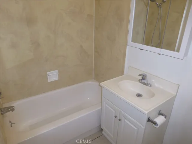 a bathroom with a sink and a bathtub