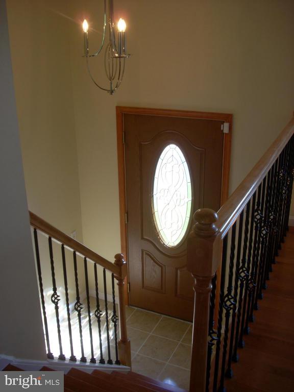 152 April Lane Lititz, PA 17543 - Photo 3 of 19 a view of staircase with railing and a mirror
