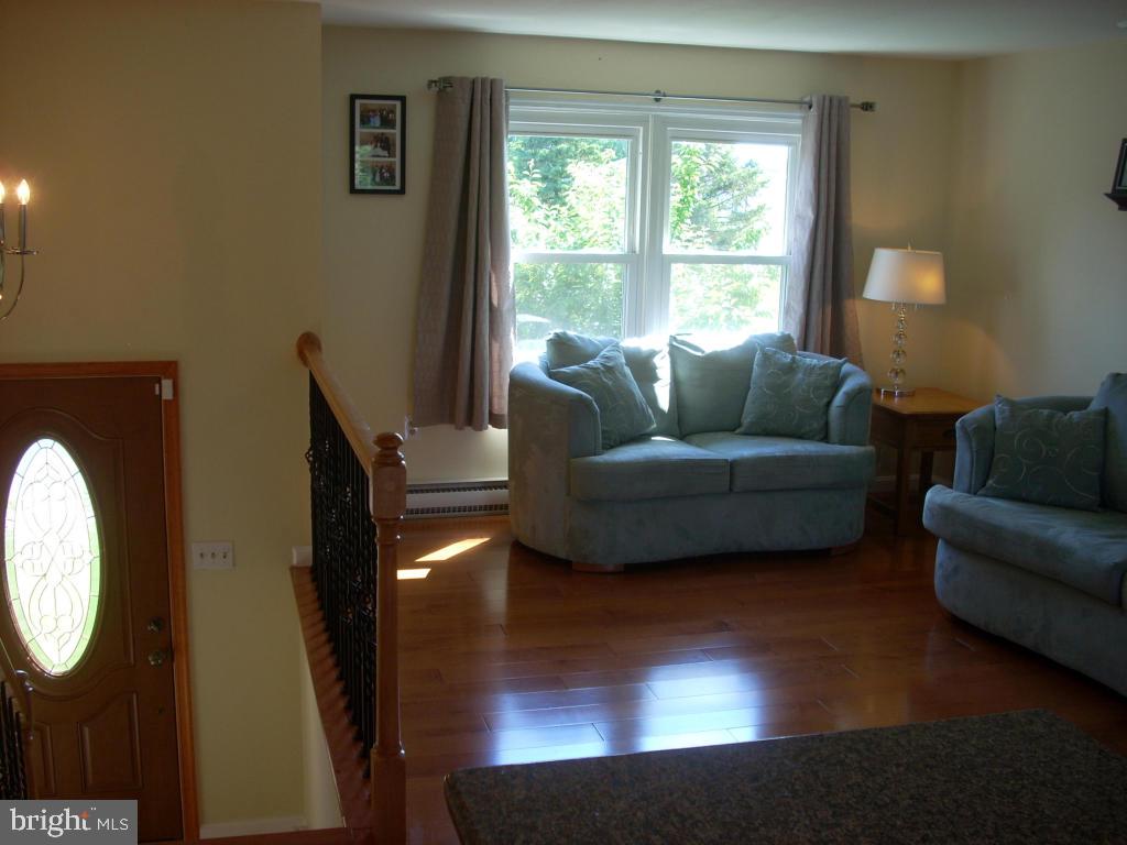 152 April Lane Lititz, PA 17543 - Photo 5 of 19 a living room with furniture and a large window