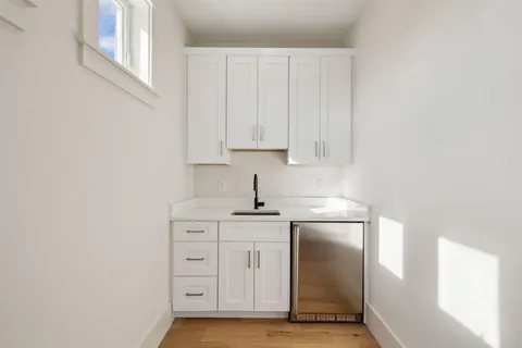 a view of a golf course of a building