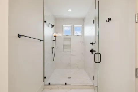 a view of a city with an ocean