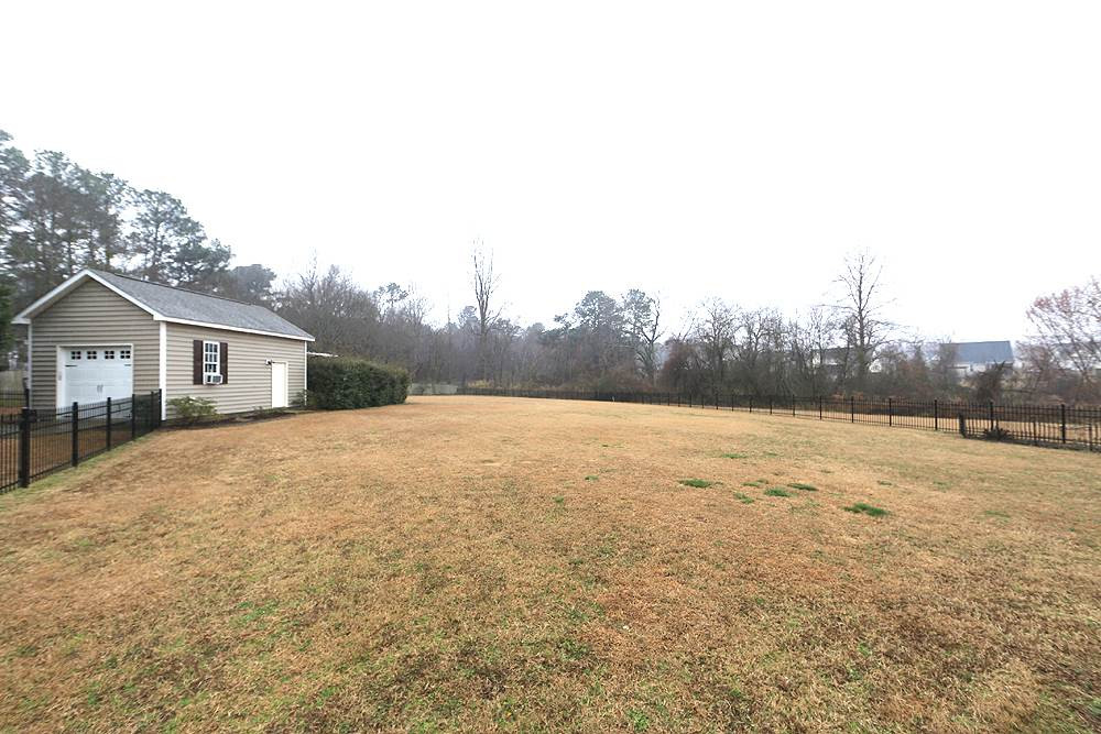 522 Open Grove Way Willow Spring, NC 27592 - Photo 23 of 25 Fenced in Back yard