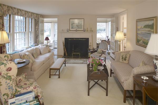 200 Prospect Street Belmont, MA 02478 - Photo 2 of 7 a living room with furniture and a fireplace