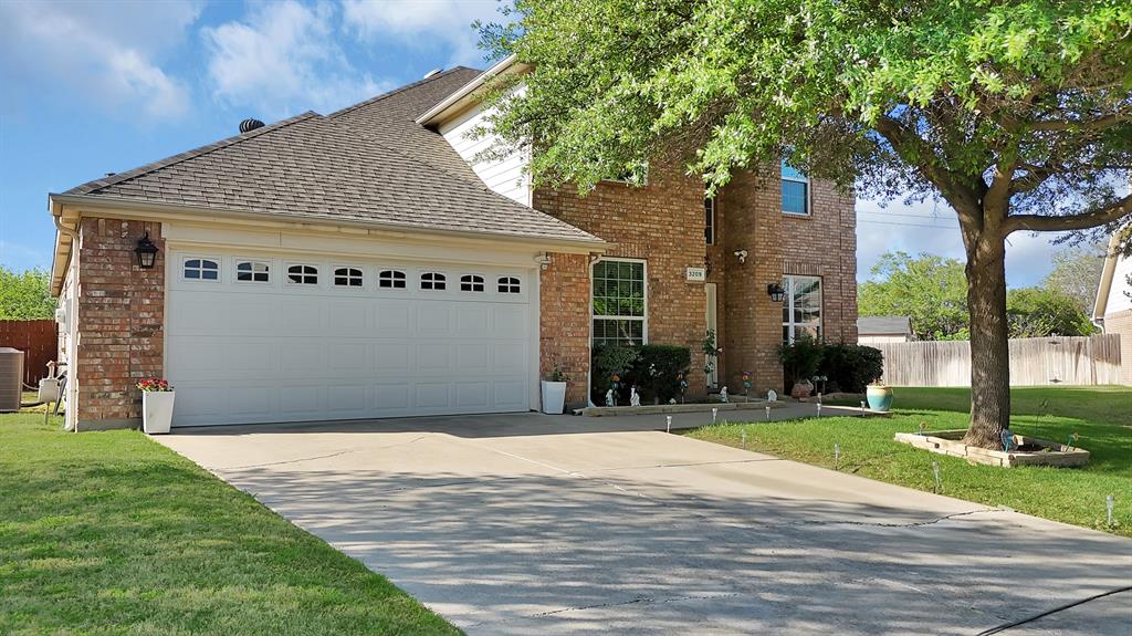 a front view of house with yard