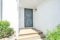 a view of a hallway with seating area