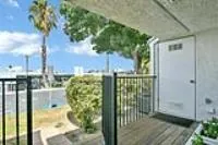 a view of a lake with a building in the background