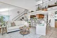 a view of living room and dining room