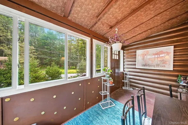 a workspace with furniture and windows