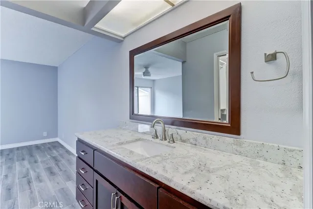 a backyard of a house with yard and outdoor seating