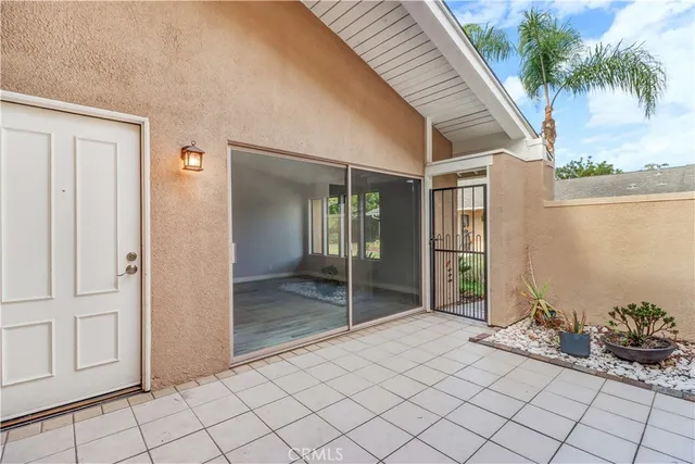 a view of swimming pool with outdoor seating