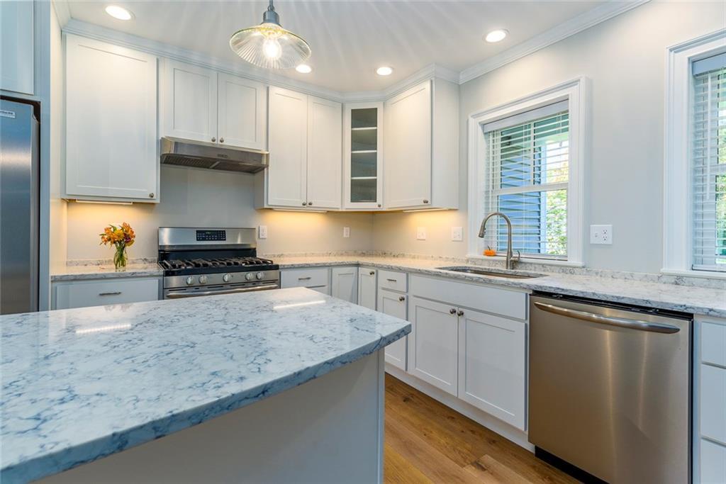 4 Carriage Road Falmouth, ME 04105 - Photo 14 of 35 Kitchen showing stainless gas stove,...