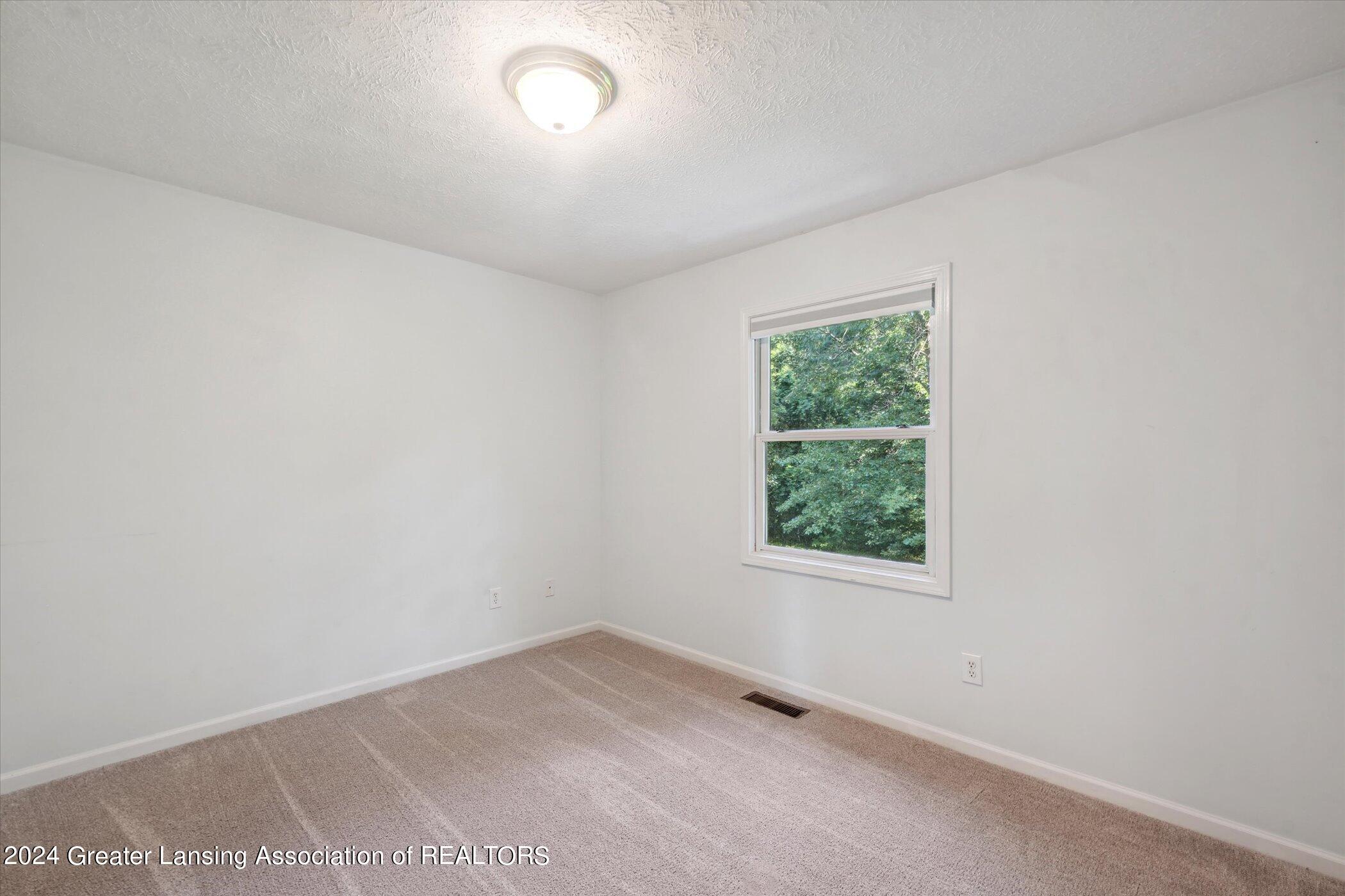 174 Newman Road Okemos, MI 48864 - Photo 27 of 54 23-174-Newman-Rd-Okemos-MI-48864-WindowS